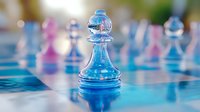 Glass chess pawn piece in blue and pink tones on reflective surface with soft bokeh background, strategic game concept for business and competition.