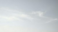 Soft gray cloudy sky with gentle white clouds creating peaceful atmospheric background for nature and weather concepts.