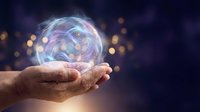Hand holding glowing holographic sphere with swirling energy patterns and bokeh lights, representing innovation, technology, and future digital concepts for business and science applications.