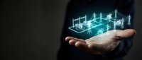 Businessman holding holographic smart home technology with connected devices and IoT network visualization for modern automation and digital lifestyle.