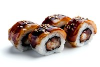 Fresh sushi rolls with eel, rice and sesame seeds topped with sweet teriyaki sauce on white background, traditional Japanese cuisine closeup.