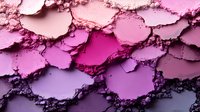 Crushed makeup eyeshadow palette texture in pink and purple gradient shades showing powder particles and pigment details, macro cosmetics photography for beauty background.