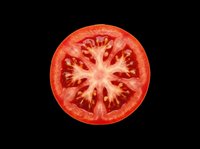 Fresh tomato slice isolated on transparent background, ready for culinary design, recipe graphics, food packaging, print-on-demand products, and digital food illustrations.