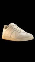 Beige suede and leather low-top sneaker with lace-up closure, isolated on transparent background. Ready for t-shirt design, clipart, stickers, and print-on-demand products.