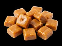 Caramel candy cubes isolated on transparent background, ready for design use on t-shirts, stickers, clipart, print-on-demand products, and sublimation projects.