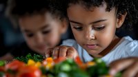 Young African American children exploring fresh vegetables and healthy ingredients during cooking activity, promoting nutrition education and family bonding.