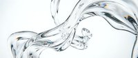 Clear water stream flowing with dynamic splash and bubbles against white background for refreshing beverage and purity concepts.