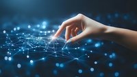 Female hand touching glowing digital network with connected dots and lines against dark blue background with bokeh lights. Technology concept for business.