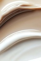 Smooth flowing curves in brown and white create an elegant abstract background with soft gradient transitions and gentle wave-like shapes for modern design projects.