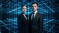 Professional business team of confident man and woman in formal suits standing against futuristic digital grid background with glowing blue lines.