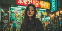Young Asian woman with long dark hair in urban night scene with colorful neon signs and city lights creating atmospheric street photography mood.