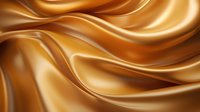 Luxurious golden silk fabric with smooth flowing waves and folds creates elegant abstract background pattern with rich caramel tones and soft shadows.