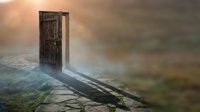 Mysterious wooden door standing alone in misty landscape with warm sunlight creating ethereal atmosphere and long shadows on stone pathway.