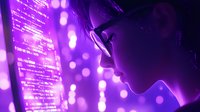 Young Asian female programmer in glasses looking at glowing purple code on screen, dramatic side profile lighting creates cyberpunk atmosphere for technology concepts.