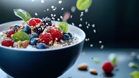 Fresh berries and nuts in yogurt bowl with splashing milk droplets against dark background, perfect for healthy breakfast advertising.
