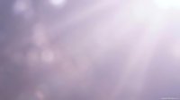 Soft purple bokeh background with dreamy light effects and gentle blur for elegant design projects and romantic presentations.