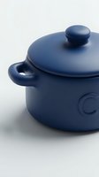 Navy blue cooking pot with lid and handles isolated on white background, suitable for kitchenware, culinary, and home cooking design projects.
