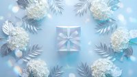 Elegant gift box with silver bow surrounded by white hydrangeas and metallic leaves on soft blue background with bokeh light effects.