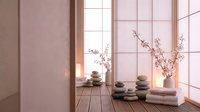 Serene spa interior with stacked zen stones, cherry blossom branches in vase, warm sunlight through windows creating peaceful meditation space for wellness.