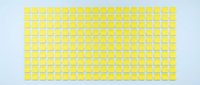 Yellow square mosaic tiles pattern on white background for bathroom kitchen interior design and home renovation projects.