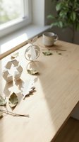 Eco-friendly workspace with recycling symbols and natural elements on wooden desk by window for sustainable business and environmental awareness.