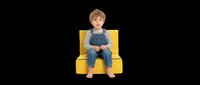 Young Caucasian boy sitting on a yellow kids sofa chair, isolated on transparent background, ready for t-shirt design, clipart, stickers, and print on demand use.