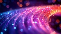 Vibrant abstract background with glowing curved lines and bokeh lights in pink, purple and blue colors creating magical cosmic effect. Suitable for tech designs.