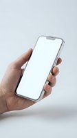 Hand holding modern smartphone with blank white screen for app mockup and digital presentation on neutral background.