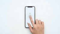 Young woman with light skin tone and manicured nails interacting with smartphone touchscreen displaying heart icon, isolated on white background for app design and digital interface mockups.
