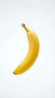 Fresh yellow banana isolated on white background, ready for food and nutrition design projects, advertising, and culinary content.