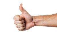 Male Caucasian hand showing thumbs up gesture against white background, isolated cutout for business and communication design concepts.