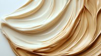 Flowing golden blonde hair strands with smooth silky texture creating elegant waves and curves for beauty and haircare concepts.