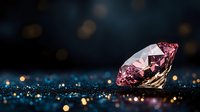Pink diamond on dark glittering surface with bokeh lights background, luxury jewelry concept with soft focus sparkles and reflections.