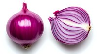 Fresh red onion whole and sliced in half showing layered interior texture on white background, isolated food ingredient for cooking and recipe designs.