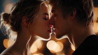 Romantic couple in intimate moment with warm bokeh lights creating dreamy atmosphere for love and relationship concepts.