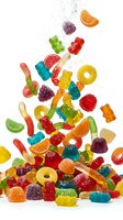 Colorful gummy candies falling and splashing with water droplets on white background for confectionery and sweet treat advertising campaigns.