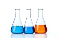 Laboratory glassware with colorful liquid chemicals in three conical flasks showing blue and orange solutions against white background, isolated for science designs.
