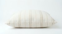 Neutral beige striped linen throw pillow on white background, isolated for home decor, interior design, and lifestyle product use.