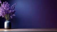 Purple lavender flowers in ceramic vase against dark blue wall background with wooden surface, moody atmospheric lighting creates elegant minimalist composition.