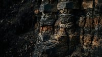 Ancient weathered brick wall with rough textured surface showing age and decay. Historic masonry background for architectural and vintage design projects.