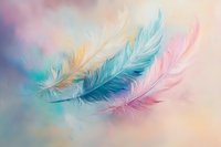 Delicate feathers in pastel pink, turquoise and gold float weightlessly against dreamy bokeh background, creating soft ethereal mood for spiritual and wellness designs.
