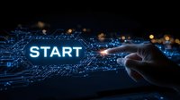 Digital transformation concept with glowing START button and circuit board patterns on dark background for business innovation and technology startup projects.