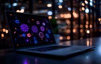 Glowing virus particles displayed on laptop screen against blurred bokeh lights background, illustrating digital health technology and medical research visualization.