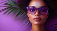 Young African American woman with natural afro hair wearing purple cat-eye glasses against vibrant purple background with palm leaf shadow creating modern fashion portrait.