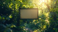 Blank screen frame surrounded by lush green foliage and magical sunlight rays creating dreamy forest atmosphere. For nature-themed presentations and storytelling.