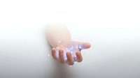 Open palm holding glowing light particles with magical sparkles floating above hand on white background for spiritual and energy concepts.