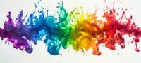 Vibrant rainbow colored ink swirls in water creating dynamic fluid art movement against white background, flowing from purple through blue, green, yellow to red spectrum.