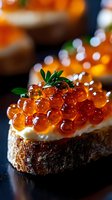 Red caviar canape on toasted bread with butter and fresh parsley garnish, macro shot with soft bokeh background. Luxurious appetizer for gourmet menu.