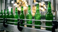 Green beer bottles on conveyor belt with bokeh lights in background, suitable for beverage industry, manufacturing, and brewery promotional materials.