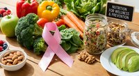 Pink ribbon with fresh vegetables, fruits, nuts and grains promoting breast cancer awareness through healthy nutrition and wellness lifestyle choices.